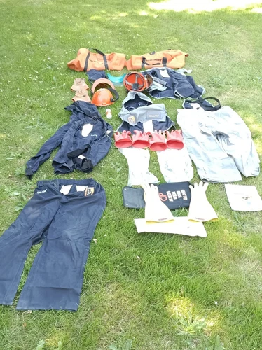 2 SALISBURY  FLAME RESISTANT COVERALL KITs, 1-40CAL XL (new)  and 1 -11CAL - product listing photo