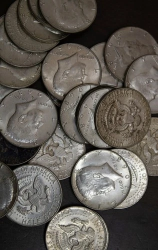 27 Kennedy Halves 40% Silver.......Lot 4902