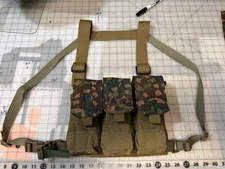 Custom micro chest rig built on Blackhawk Molle 6 mag pouch, with DOT 44 Camo. 