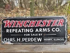 VINTAGE WINCHESTER REPEATING ARMS CO PORCELAIN SIGN 12"×5"