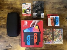 Nintendo Switch OLED W/ Mario Kart 8 Deluxe, SuperSmash Bros Ult  Accessories