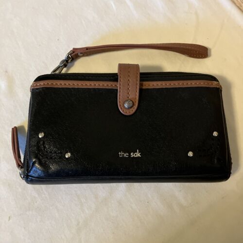 The Sak Black Leather Zip Around Wristlet With Cell Phone Snap Close Pocket