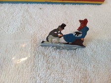 1920's HANS HEINRICHSEN flat lead figures couple tieing skate collectible b