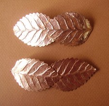 1499 / Pair of Low Clamps "Sheets" Gold Metal