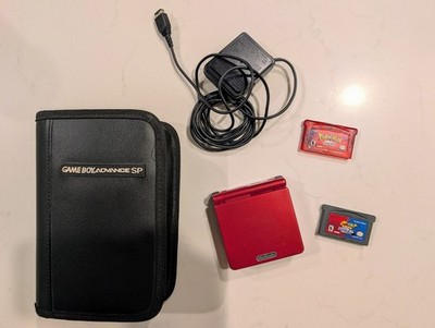 Red Nintendo Game Boy Advance SP, Pokémon Ruby, Pokémon Pinball, & Leather Case