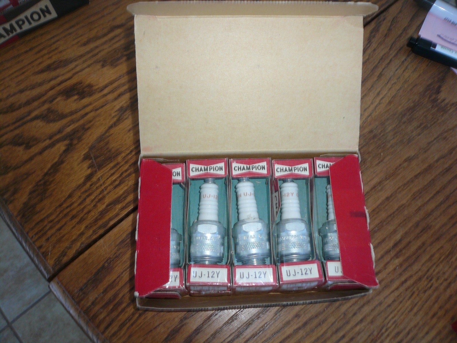 NOS Champion UJ-12Y Spark Plugs .. Circa 1950-1960s .. Engraved .. USA MADE