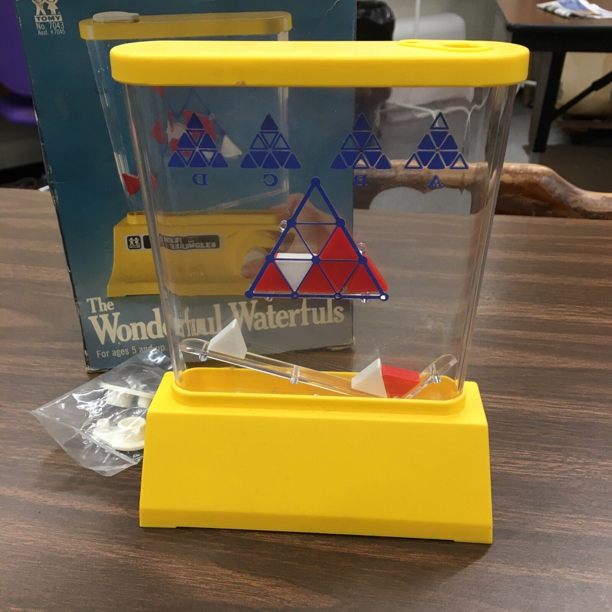TOMY Waterfuls Tricky Triangles Handheld Puzzle Water Game