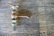 Antique brass faucet 4 point star handle porcelain center