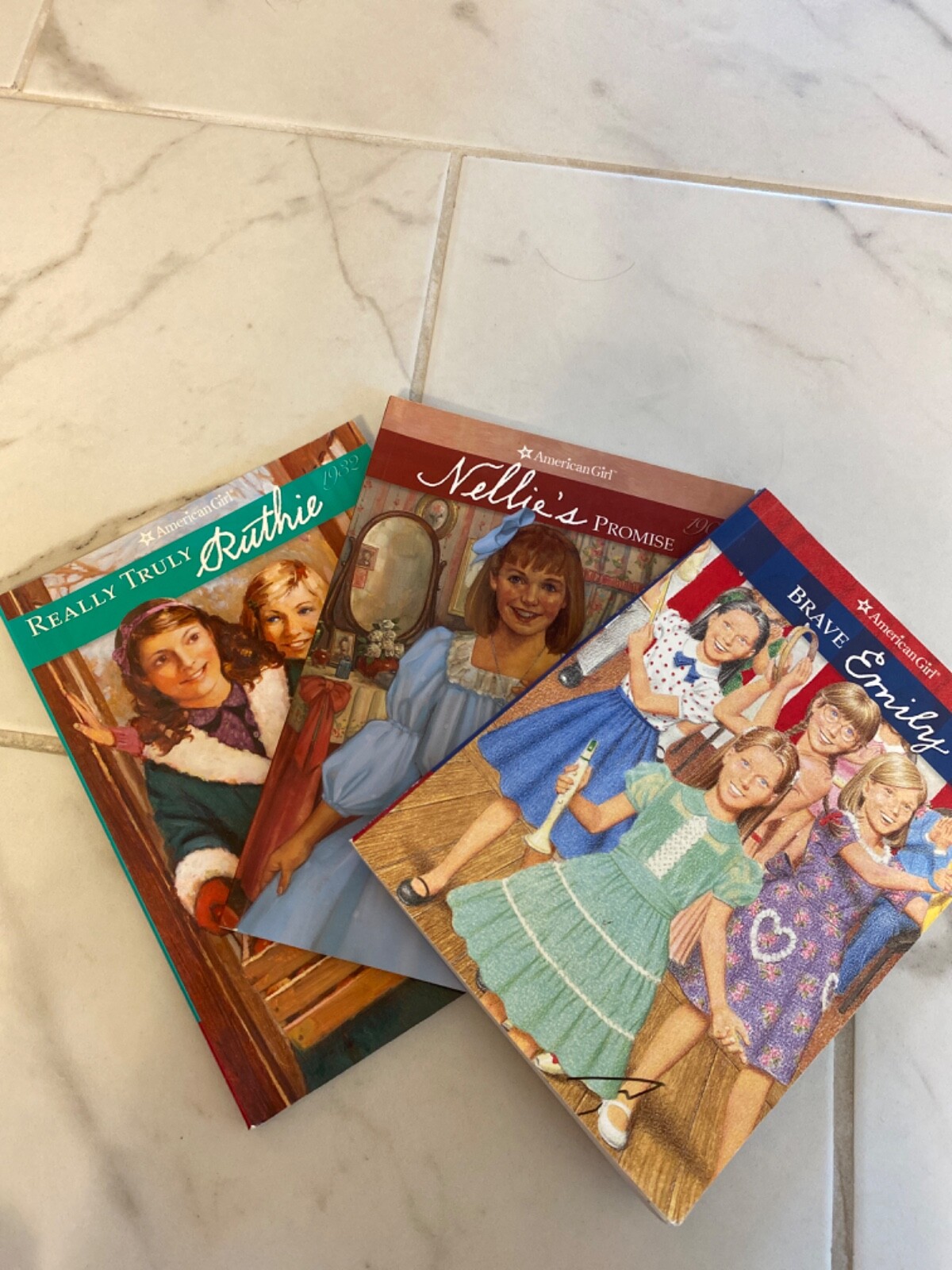 American Girl books (Really Truly Ruthie, Nellie’s Promise, and Brave Emily)