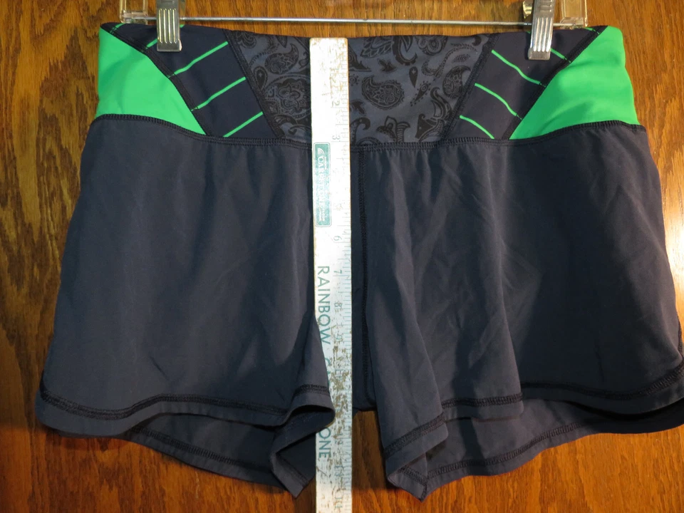 Tintero corto Lululemon 8 Groovy Run azul marino cachemira verde frijol a rayas ¡EXCELENTE ESTADO USADO! ¡Raro! Foto 2 de 4