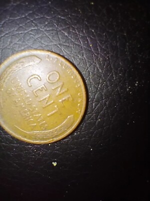1944D Lincoln wheat penny D mint mark.One Cent Coin, Rim Error  L  In Liberty-8