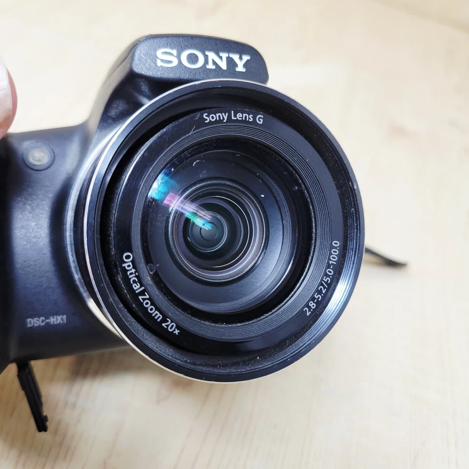 Cámara digital Sony Cyber-shot DSC-HX1 zoom 9,1 MP 20x FUNCIONA PUERTA FALTANTE COMO ESTÁ Foto 2 de 4