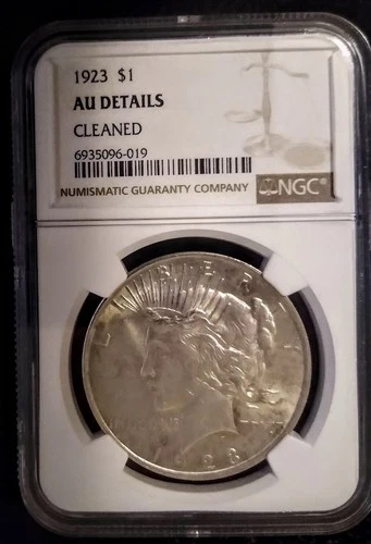 1923 SILVER PEACE DOLLAR NGC AU