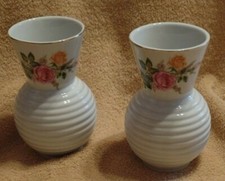 Pair of Schmidt Porcelana vases, Leart, 5.5". white w/ beehive ribbing & flowers