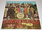 The Beatles-Sgt Pepper LP (1975 Reissue, UK, Parlophone PCS 7027) VG+/VG+