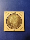 1879-S Morgan Silver Dollar In Brilliant Uncirculated Condition