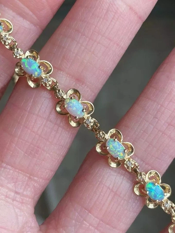 Brazalete para mujer 7,00 quilates corte ovalado ópalo de fuego simulado enchapado en oro amarillo de 14 quilates de 7" Foto 2 de 4
