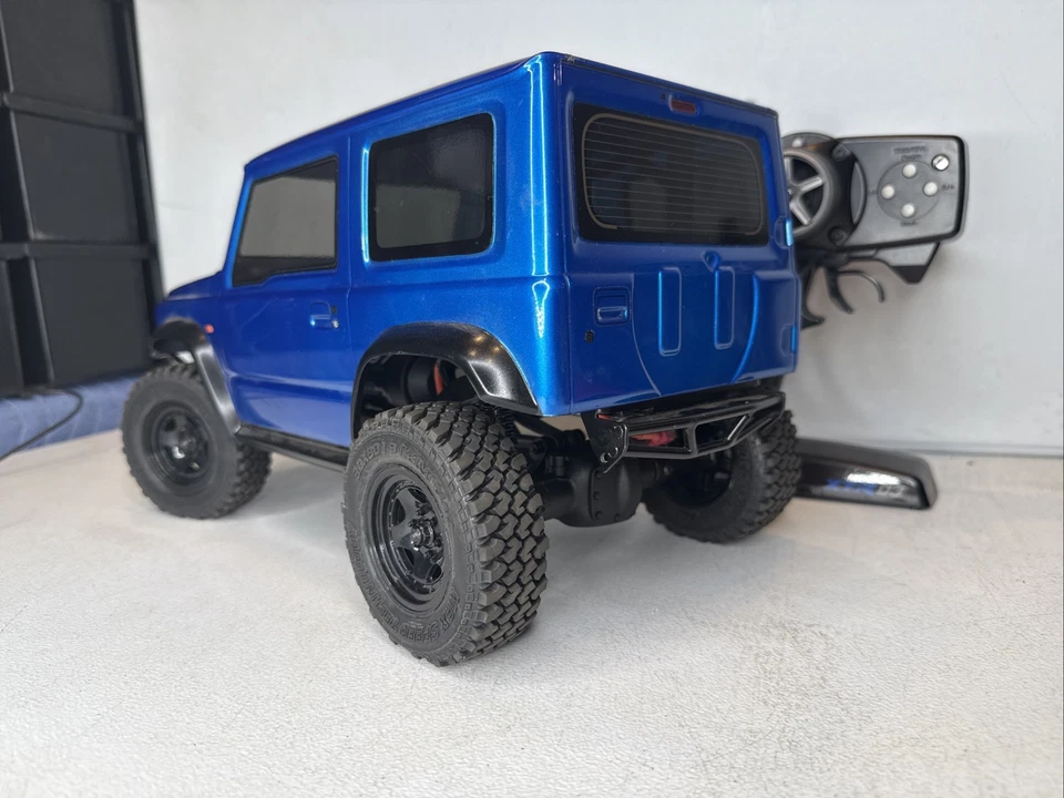 MST CMX Jimny Blue J4 1/10 Scale Crawler RTR W/ RC4WD Hop UPS Rock Crawler - Image 4 of 4