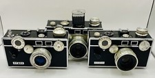 Lot Of 3 Argus Cameras 2 Range Finders And 1 Flash Finder And 1 Leather Case