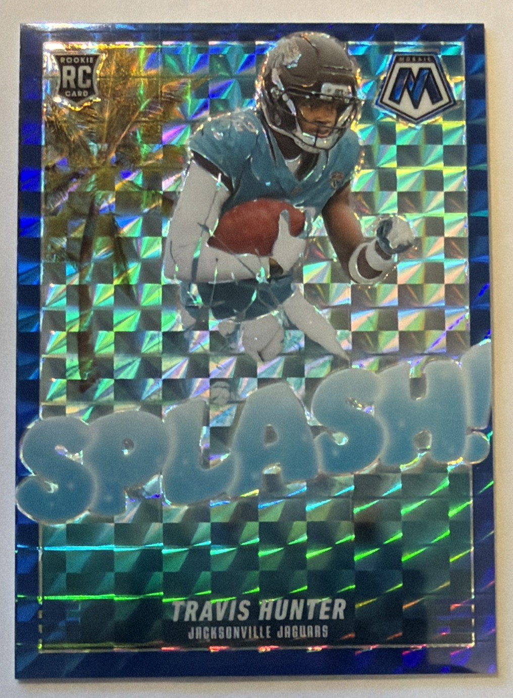 2025 Mosaic Splash! Travis Hunter Blue Prizm /99 RC #16 Jacksonville Jaguars