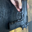 UKARMS M757 6mm Spring Airsoft Pistol w/ Magazine, Black, Orange Tip — photo 4