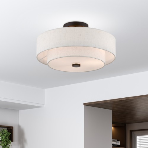 Clean and minimal 3-light flush mount with oatmeal drum shade and white diffuser - Picture 15 of 15
