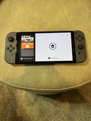 Nintendo Switch OLED Model HEG-001 Handheld Console - 64GB - White - Bundle