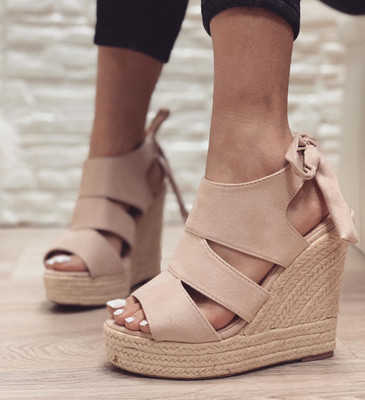 sandali zeppa firmati