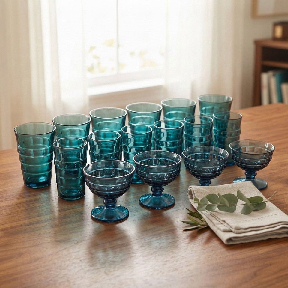 A complete 22-piece set of Indiana Glass Whitehall Riviera Blue barware — that satisfying honeycomb texture in a gorgeous vintage blue that's nearly impossible to find complete.