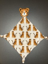 Doudou Losange Plat bio tigre blanc orange noir Monoprix Bout'chou