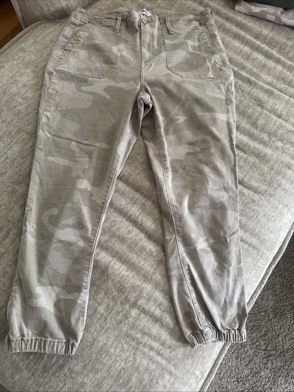 Paige Mayslie joggers in a beige and green camo  functional ankle zippers.