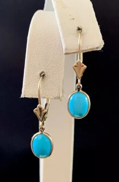 Pendientes colgantes colgantes ovalados turquesa natural chapados en oro amarillo de 14K Foto 2 de 4