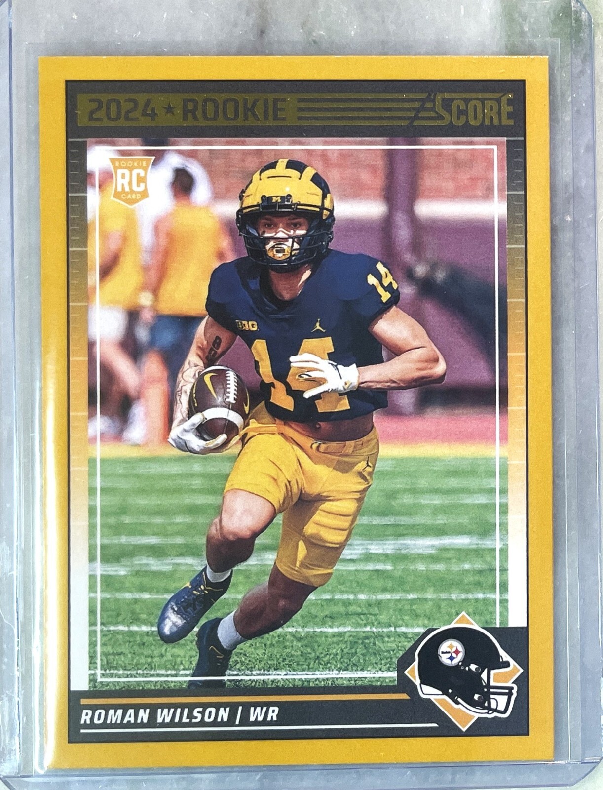 2024 Panini Score Roman Wilson Orange Parallel Rookie Card -#360 Pitts. Steelers
