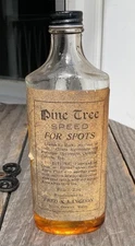 Antique Advertising Pine Tree Speed for Spots Fred S Langdon N Berwick Me Bottle