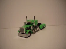 DCP FIRST GEAR 1/64 GREEN PETERBILT 359 WITH 36" SLEEPER
