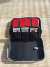 Nintendo 3DS XL Red/Black - Includes Stylus, Case + 3 Games