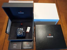 Tudor Black Bay 41 black dial blue bezel.