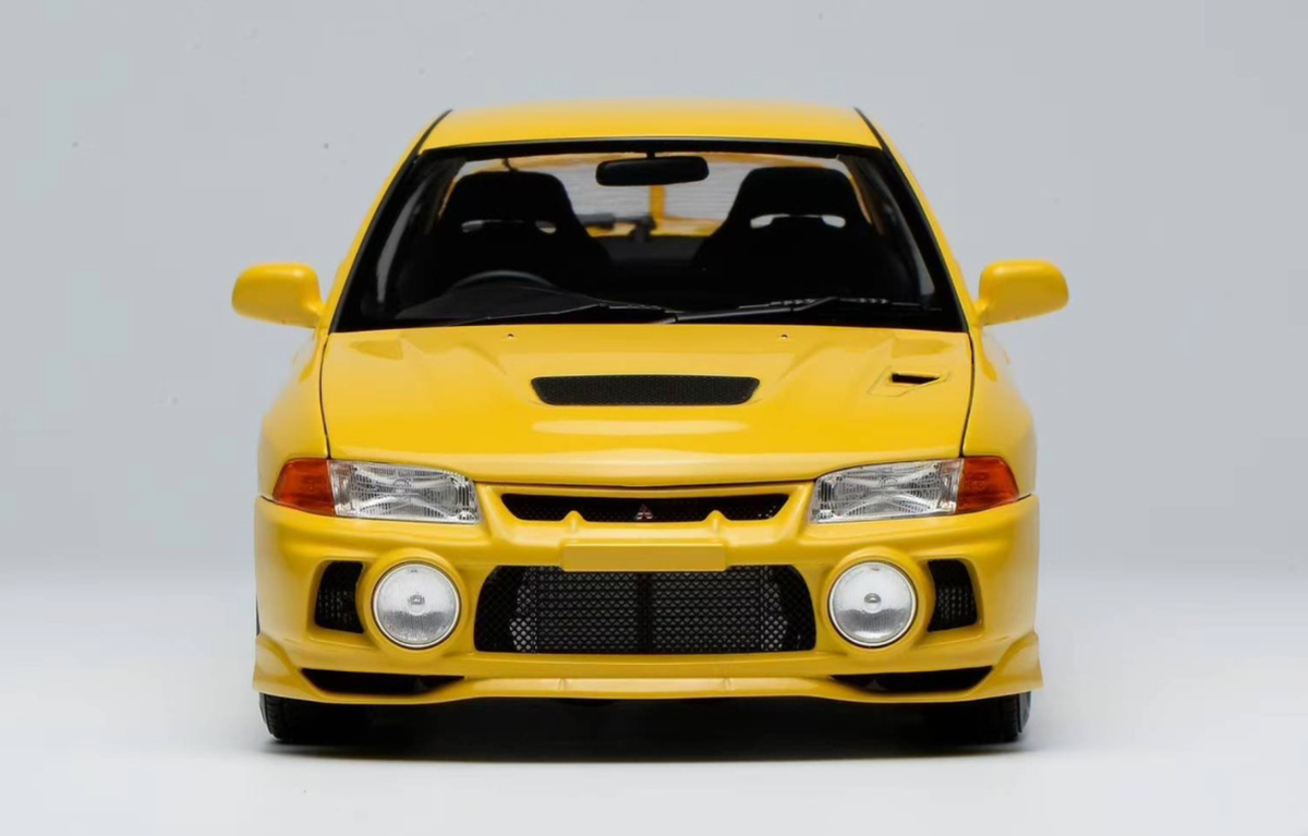 1/18 MotorHelix Mitsubishi Lancer Evolution IV Dandelion Yellow