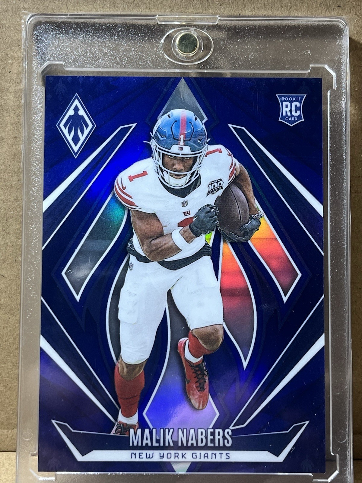 2024 Panini Phoenix - Rookies Malik Nabers #221 Blue 50/50 (RC)