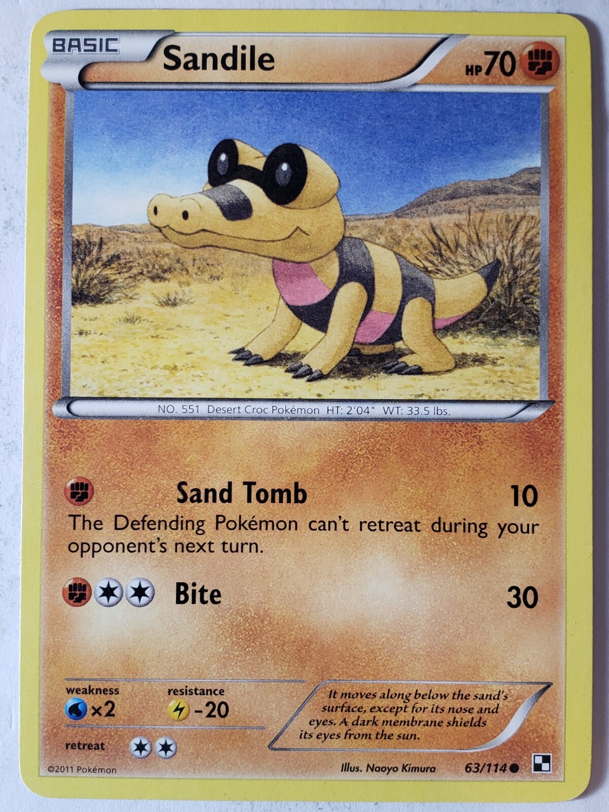 Sandile 63/114 LP - Black White Pokemon Card - Naoyo Kimura Art