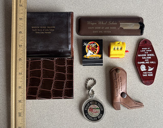 Lot of 7 vntg Harvey's Wagon Wheel Casino Memorabilia Key Chains wallet etc.