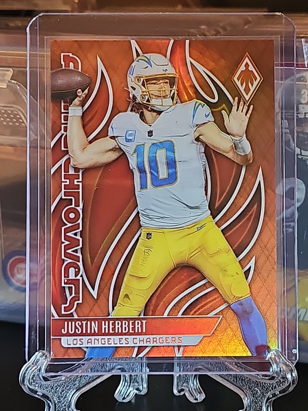 2023 Panini Phoenix - Flame Throwers Justin Herbert #FLA-25 Orange /99
