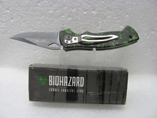 New in Box Biohazard Zombie Tactical Knife with Green Skulls; Zombie Survival