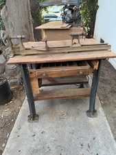 Vintage Manual Woodworking Lathe with Electric Motor on Wooden Workbench