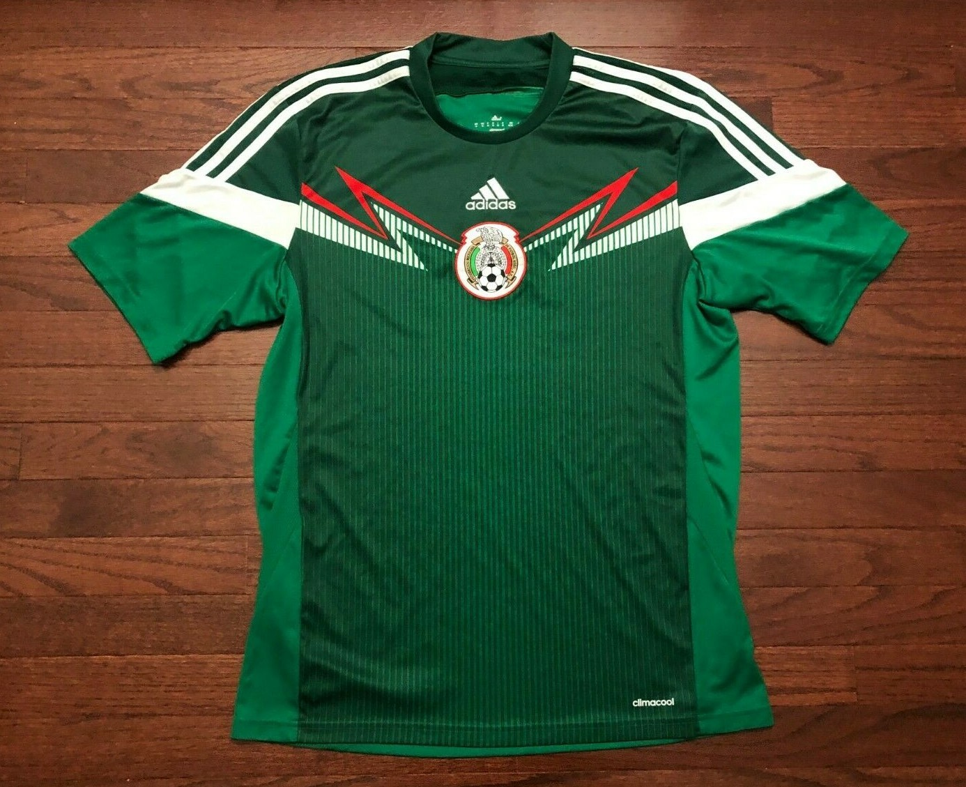 green and white soccer jersey team