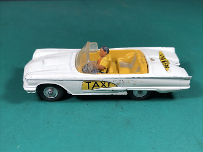 A COLLECTION OF BOXED CORGI TOYS MODEL VEHICLESComprising 430 Bermuda Taxi, 443 Plymouth U.S. M
