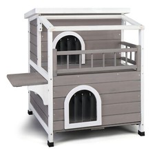 A luxurious wooden cat house with two floors, both indoor and outdoor