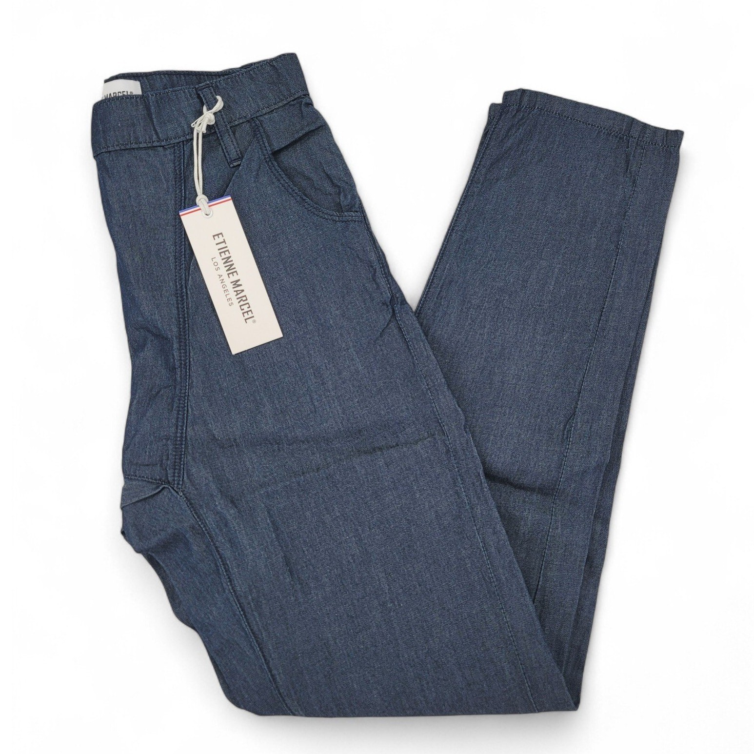 Blue Etienne Marcel skinny crop jeans with white tag and belt loops, made in USA, stretch waist, and front pockets.