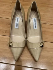 Jimmy Choo Patent Leather Pumps With A Pointed For And Decorative Buckle 