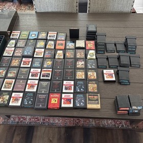 Vintage Atari 2600 Console With 83 Games and (8 Intellivision Games) Not Tested